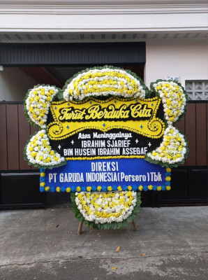 Papan Bunga Duka di Sang Tombolang